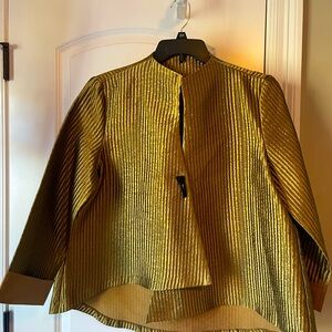 Beautiful holiday top by IC CONNIE Brand.